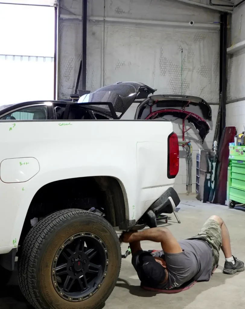 certified collision repair tech working